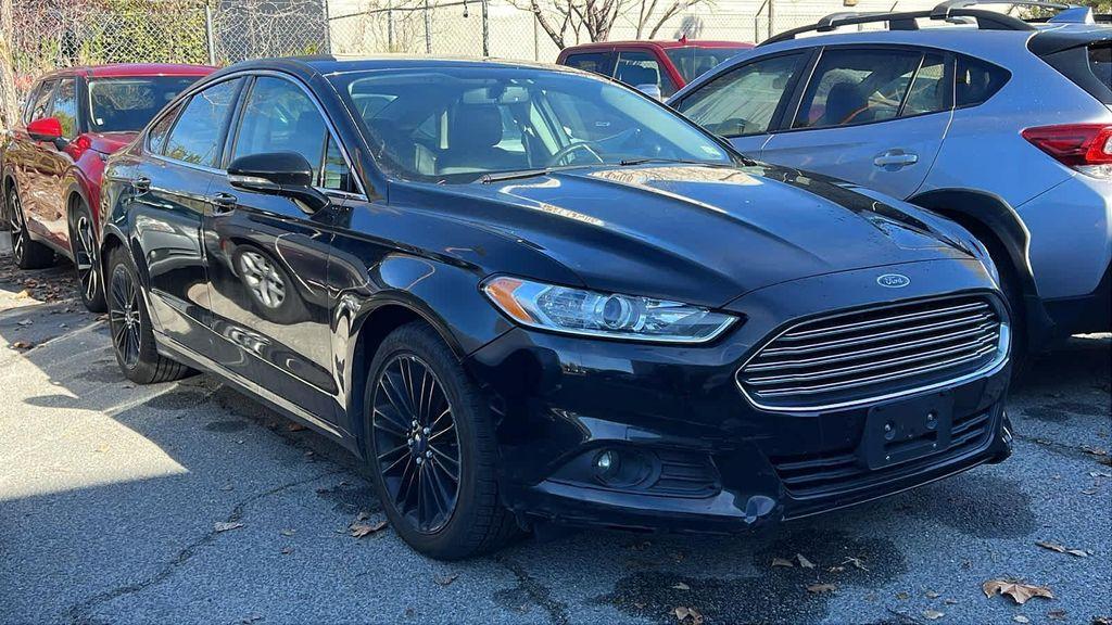 used 2016 Ford Fusion car, priced at $9,999