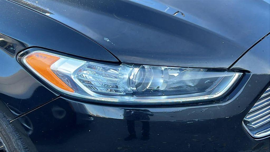 used 2016 Ford Fusion car, priced at $9,999