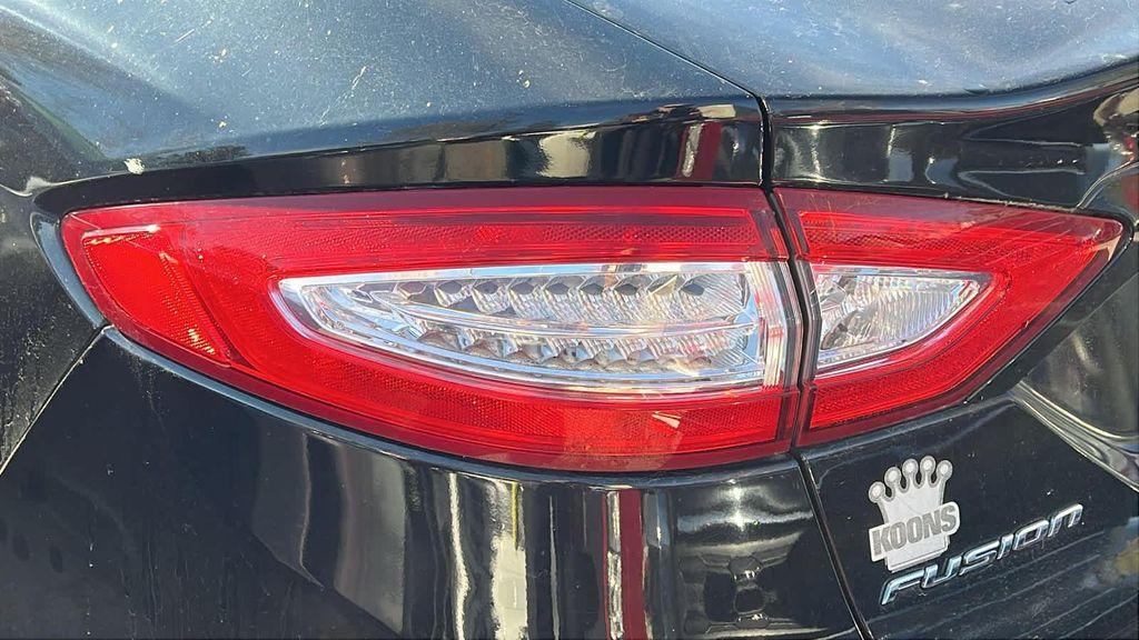 used 2016 Ford Fusion car, priced at $9,999