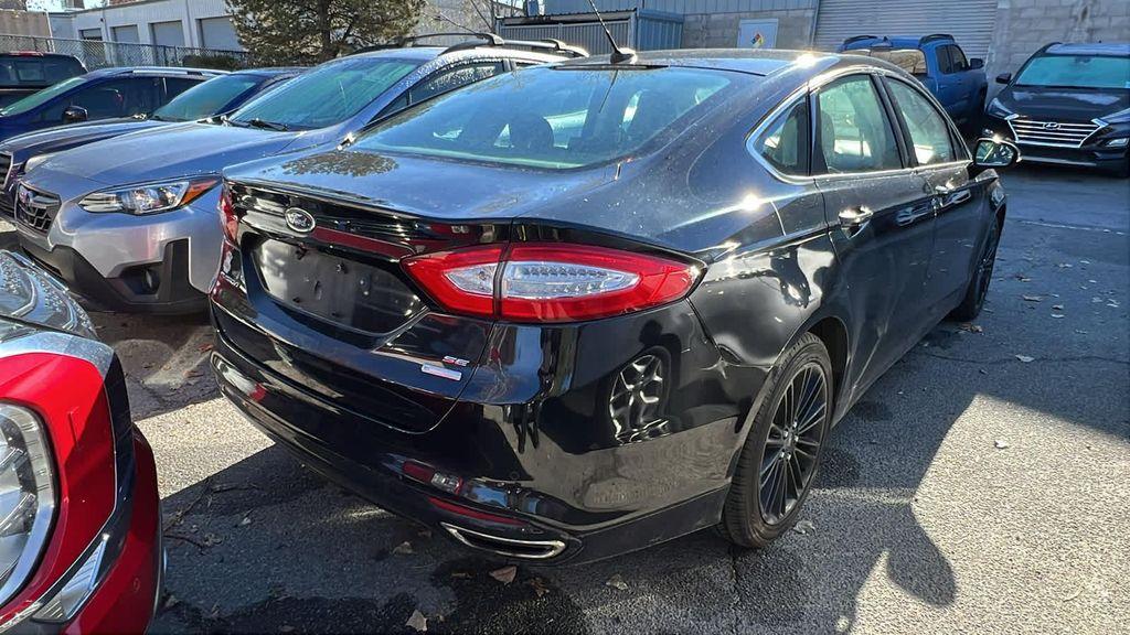 used 2016 Ford Fusion car, priced at $9,999