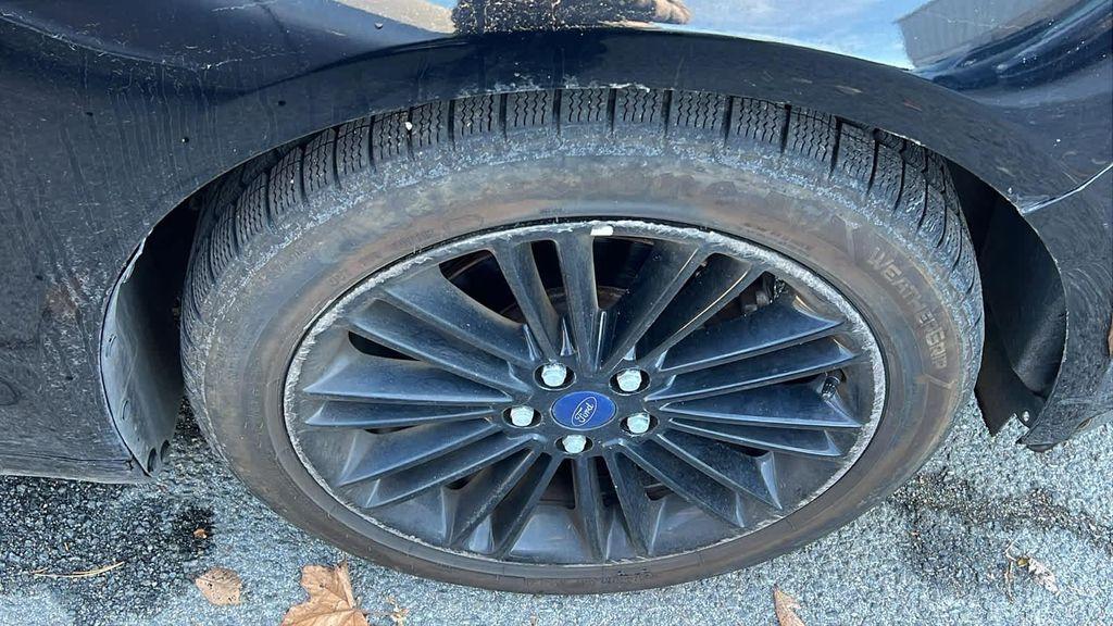 used 2016 Ford Fusion car, priced at $9,999