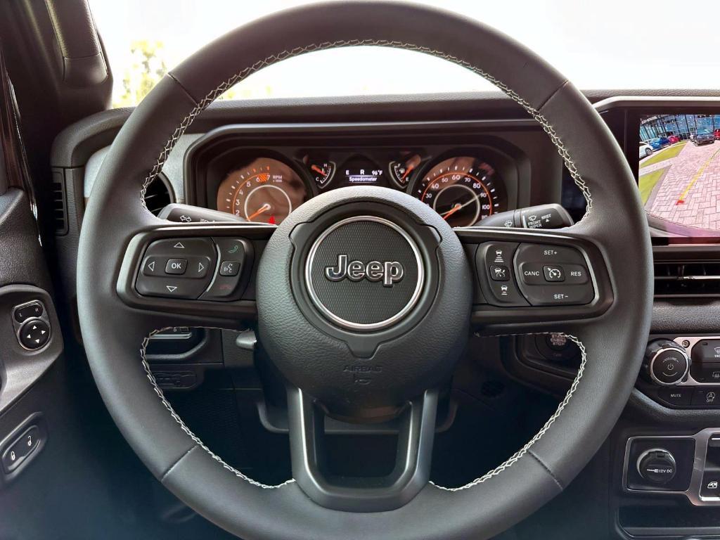 used 2025 Jeep Wrangler car, priced at $32,804