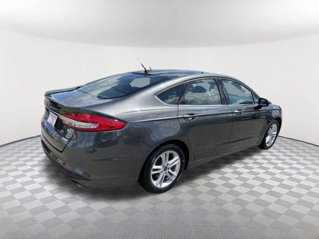 used 2018 Ford Fusion car, priced at $13,498