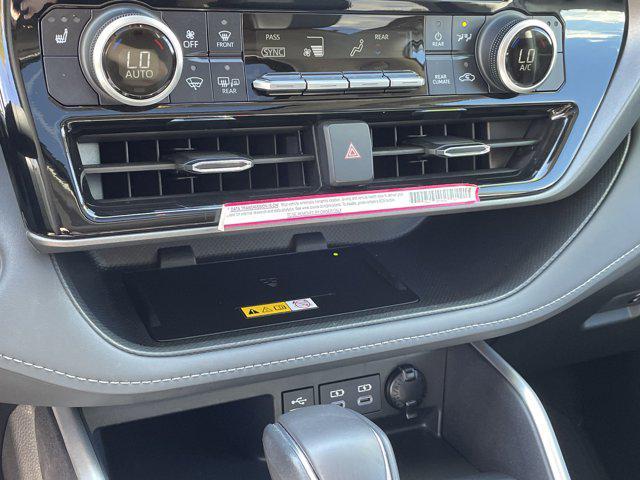 used 2024 Toyota Highlander Hybrid car, priced at $43,900