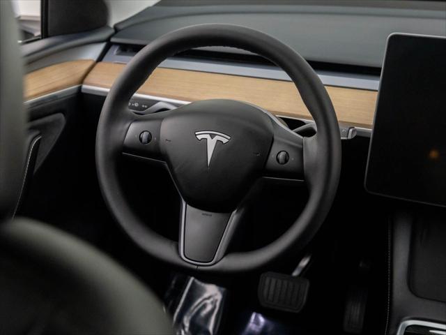 used 2024 Tesla Model Y car, priced at $34,600