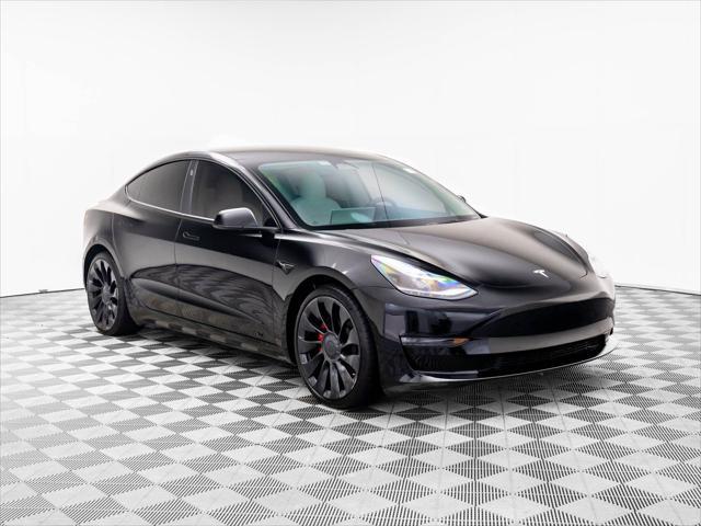 used 2022 Tesla Model 3 car, priced at $30,900