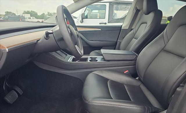 used 2023 Tesla Model Y car, priced at $32,995