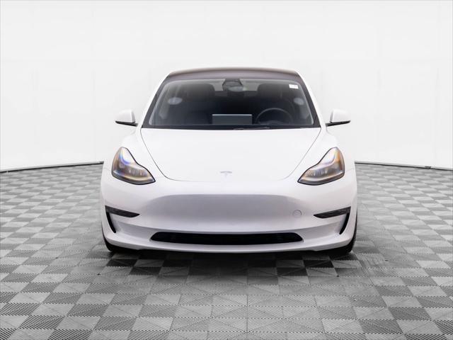 used 2023 Tesla Model 3 car, priced at $31,995