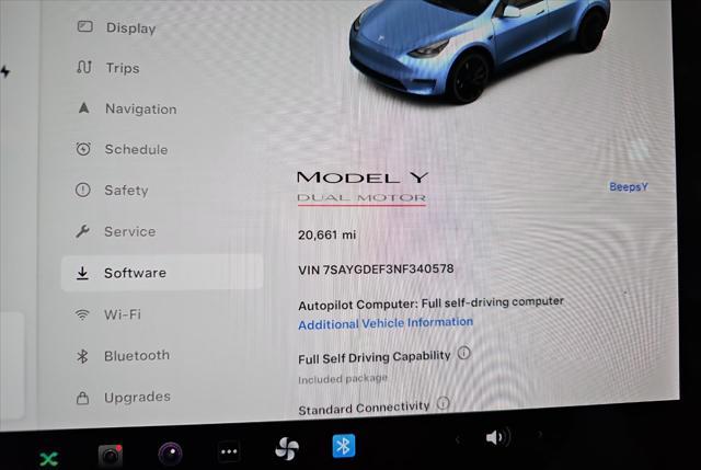 used 2022 Tesla Model Y car, priced at $34,995