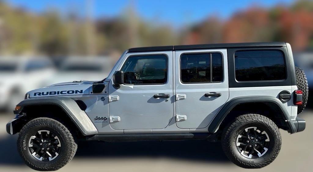 used 2024 Jeep Wrangler 4xe car, priced at $34,455