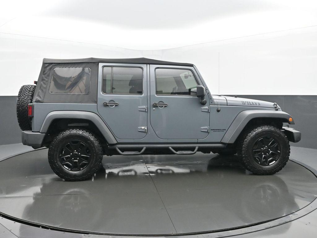 used 2014 Jeep Wrangler Unlimited car, priced at $20,491