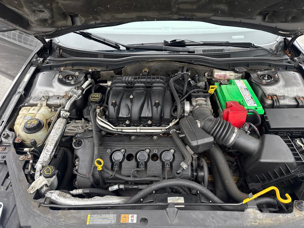 used 2012 Ford Fusion car, priced at $4,590