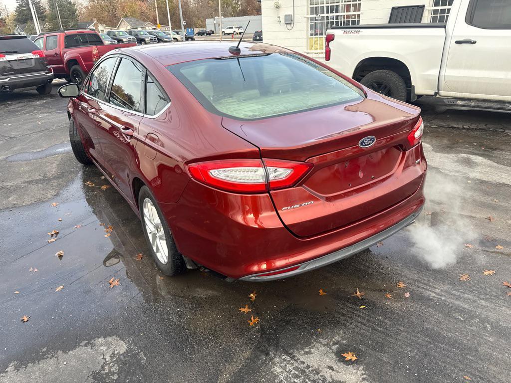 used 2014 Ford Fusion car, priced at $4,990