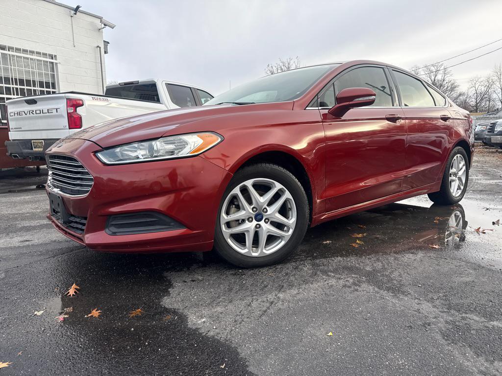 used 2014 Ford Fusion car, priced at $4,990