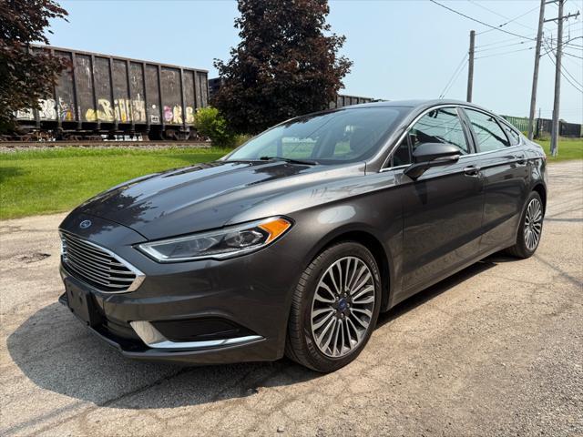used 2018 Ford Fusion car, priced at $7,990