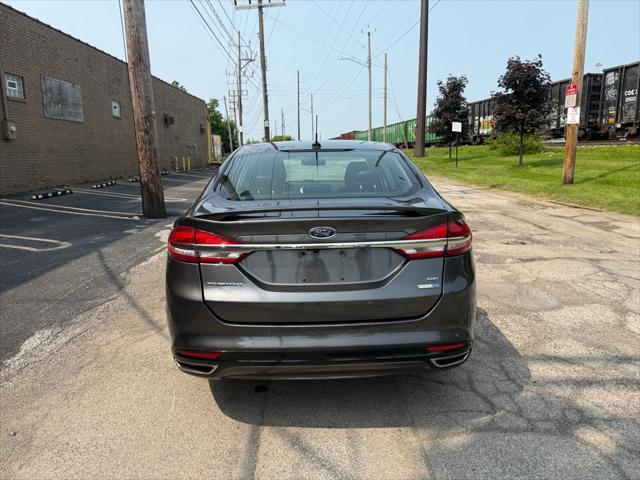 used 2018 Ford Fusion car, priced at $7,990