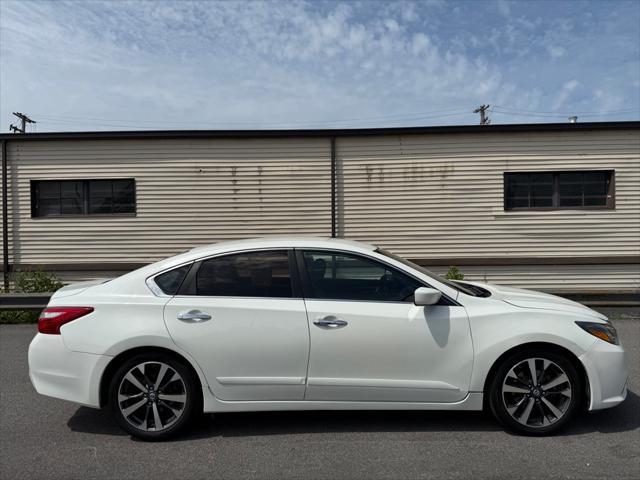 used 2016 Nissan Altima car, priced at $6,990