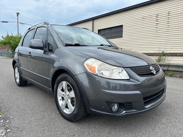 used 2011 Suzuki SX4 car, priced at $5,590