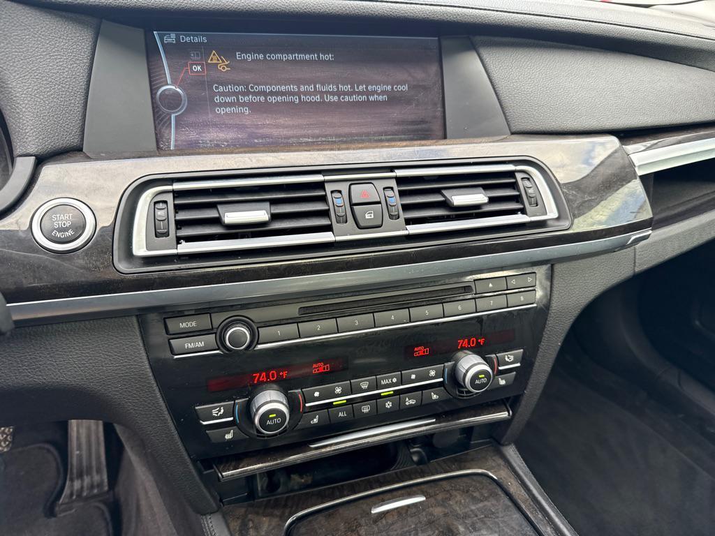 used 2012 BMW 750 car, priced at $9,990