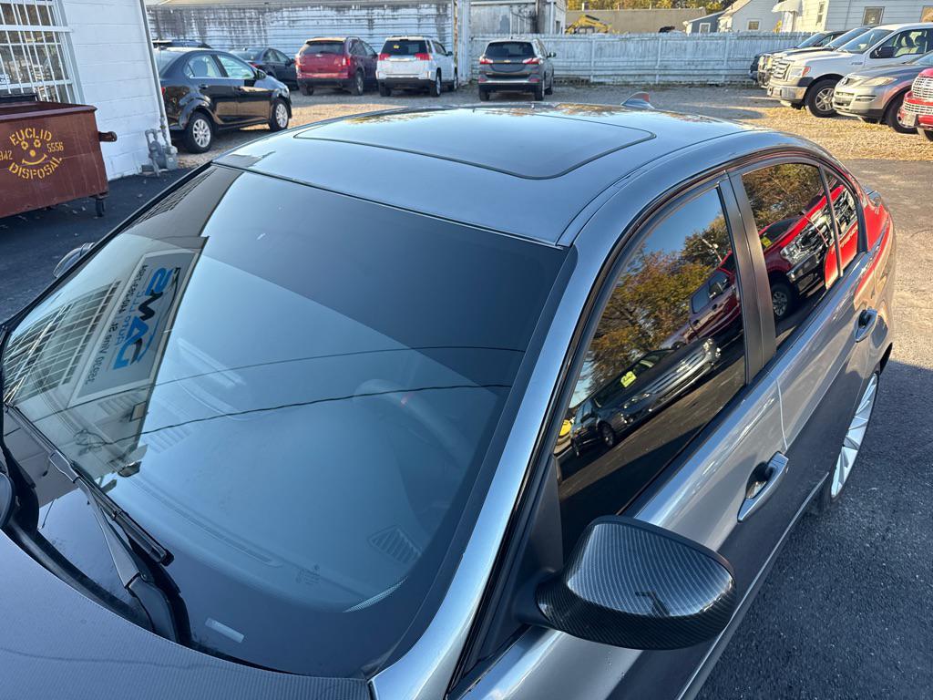 used 2011 BMW 335 car, priced at $99