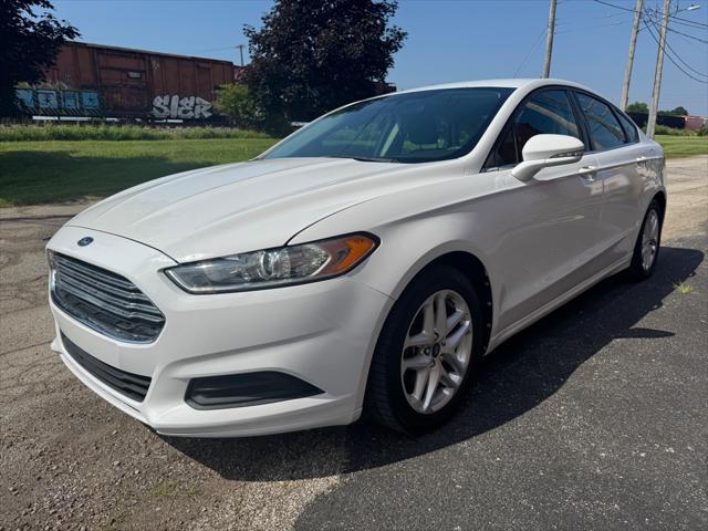 used 2013 Ford Fusion car, priced at $5,990
