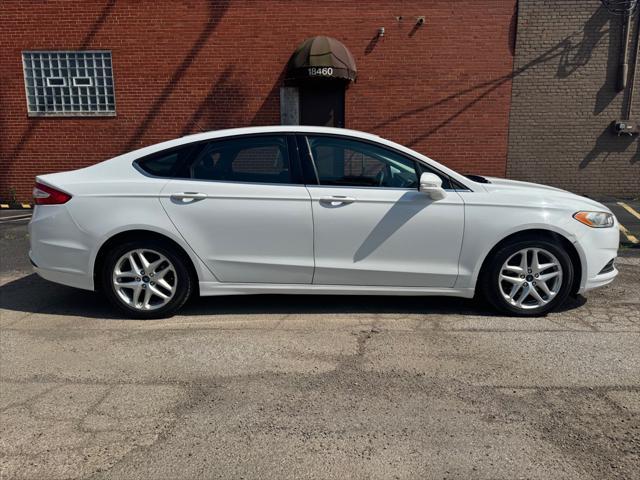 used 2013 Ford Fusion car, priced at $5,990