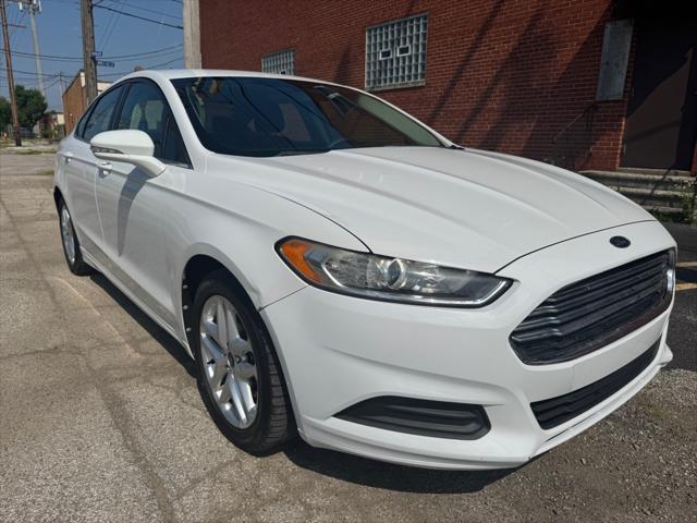 used 2013 Ford Fusion car, priced at $5,990