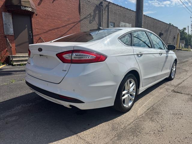 used 2013 Ford Fusion car, priced at $5,990