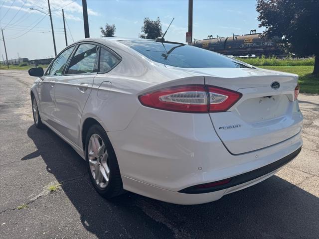 used 2013 Ford Fusion car, priced at $5,990
