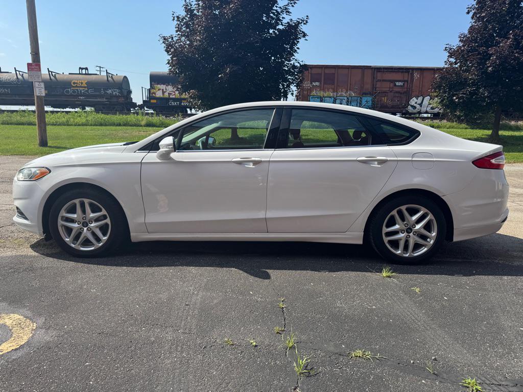 used 2013 Ford Fusion car, priced at $5,990