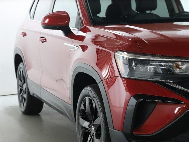 used 2023 Volkswagen Taos car, priced at $21,875