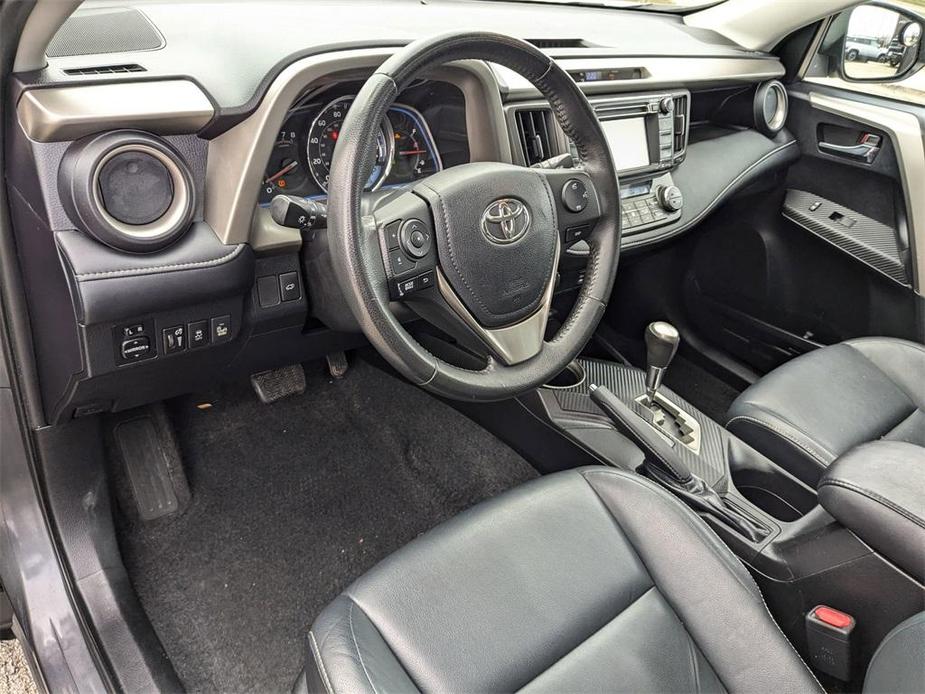 used 2013 Toyota RAV4 car, priced at $13,000