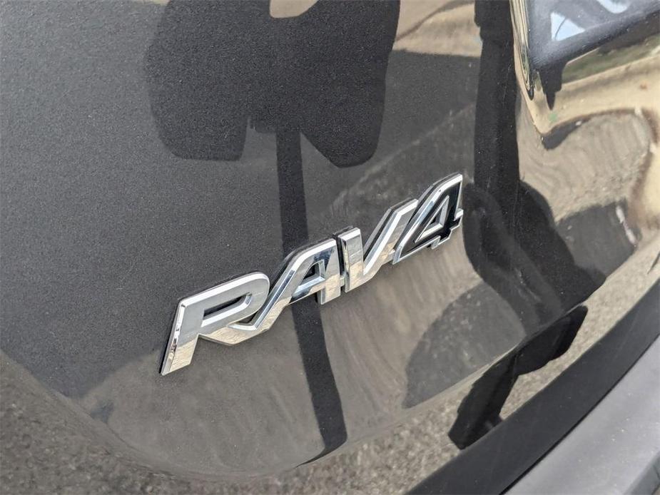 used 2013 Toyota RAV4 car, priced at $13,000