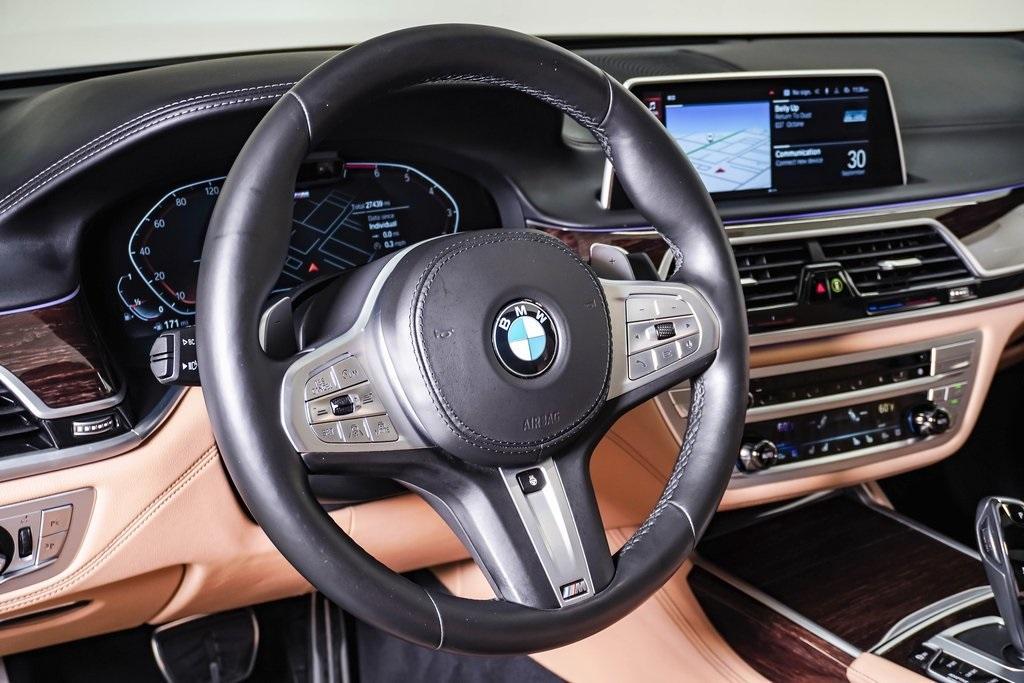 used 2021 BMW 750 car, priced at $52,500