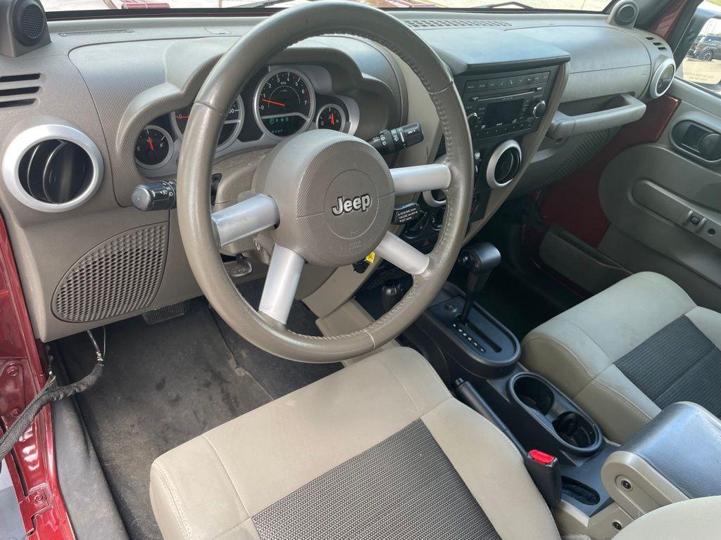 used 2010 Jeep Wrangler Unlimited car, priced at $9,000