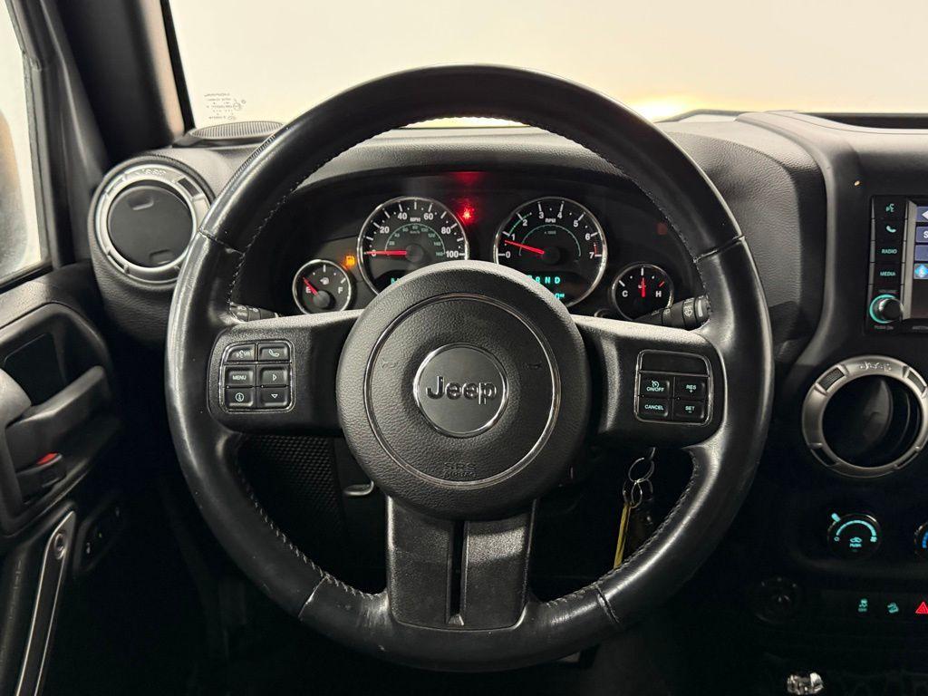 used 2015 Jeep Wrangler Unlimited car, priced at $18,250