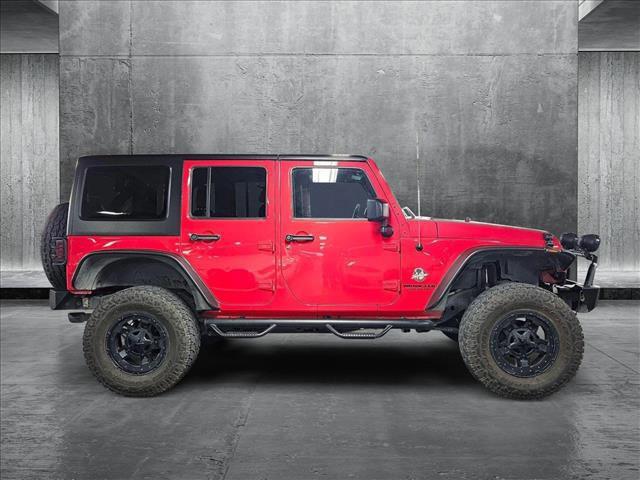 used 2016 Jeep Wrangler Unlimited car, priced at $25,496