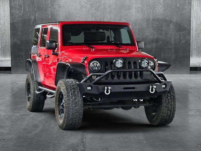 used 2016 Jeep Wrangler Unlimited car, priced at $25,496