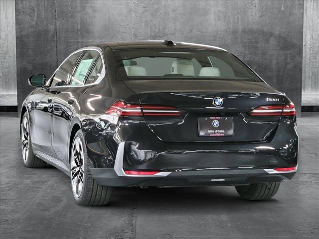 new 2025 BMW 530 car, priced at $64,525