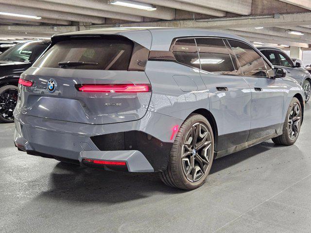 new 2025 BMW iX car, priced at $106,225