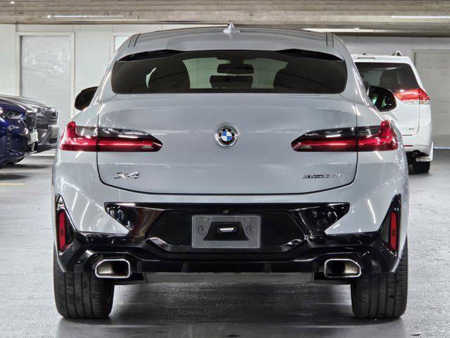 used 2022 BMW X4 car, priced at $41,491