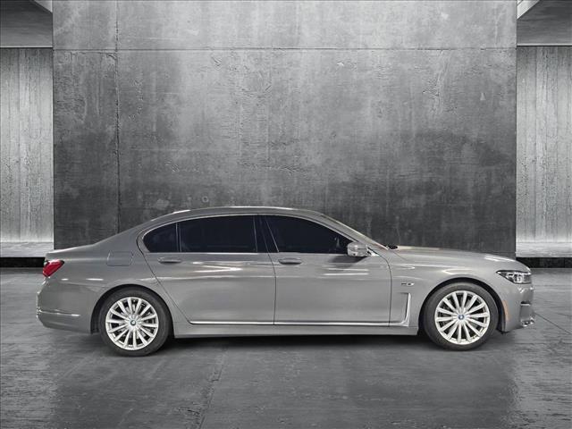 used 2022 BMW 745e car, priced at $55,876