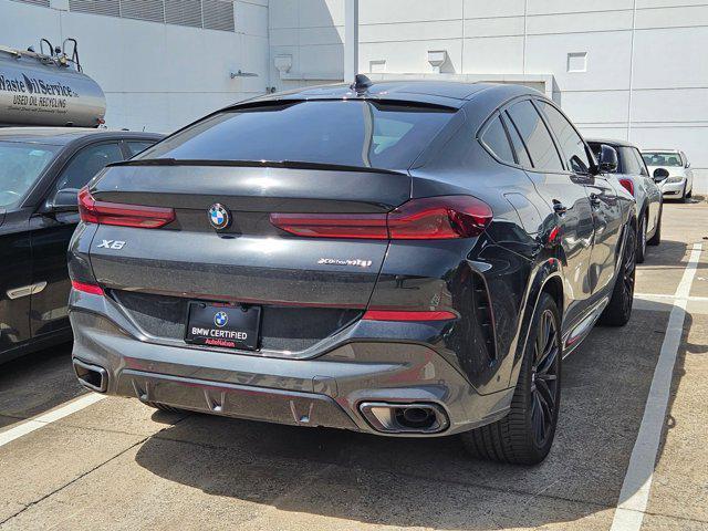 used 2023 BMW X6 car, priced at $61,491