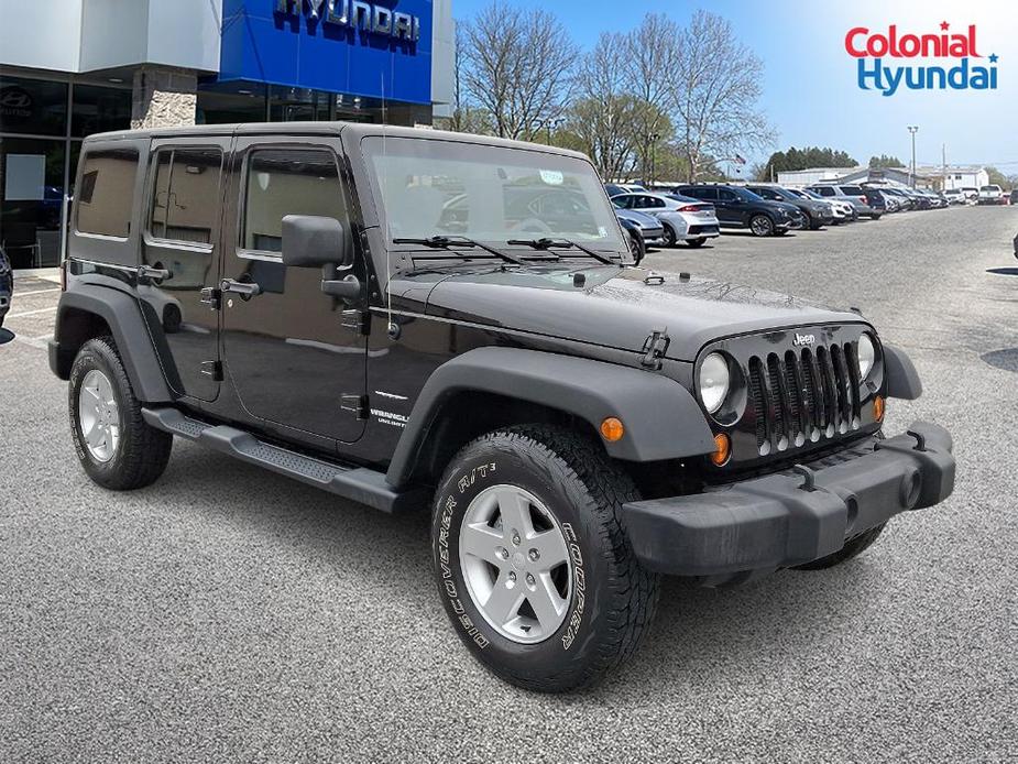 used 2013 Jeep Wrangler Unlimited car, priced at $17,900