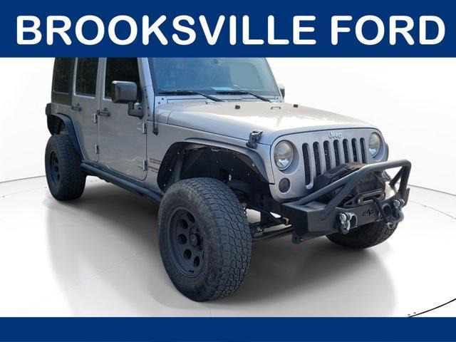used 2016 Jeep Wrangler Unlimited car, priced at $16,921
