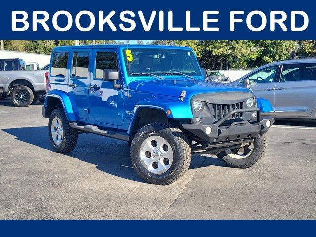 used 2015 Jeep Wrangler Unlimited car, priced at $17,323