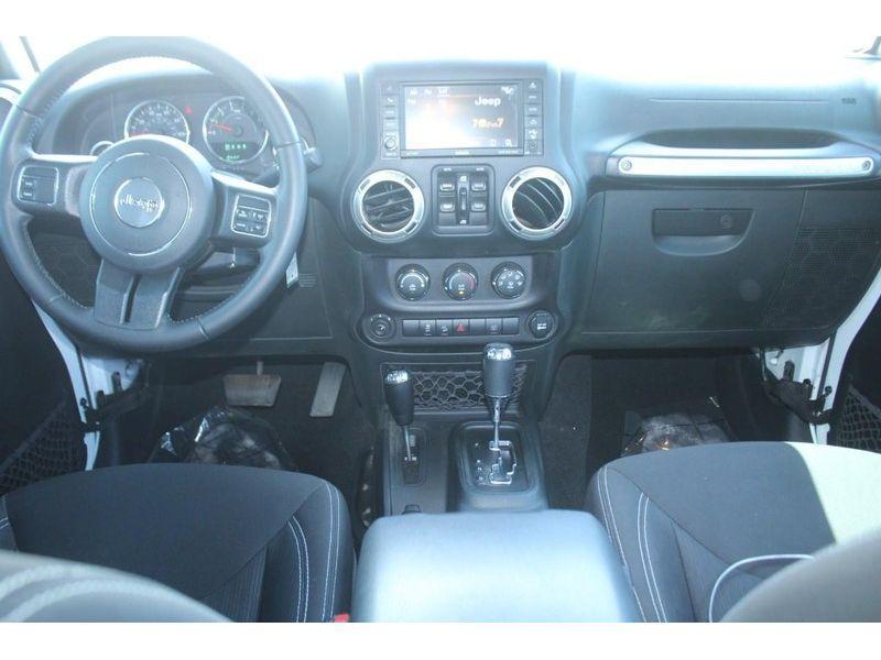 used 2018 Jeep Wrangler JK Unlimited car, priced at $26,839