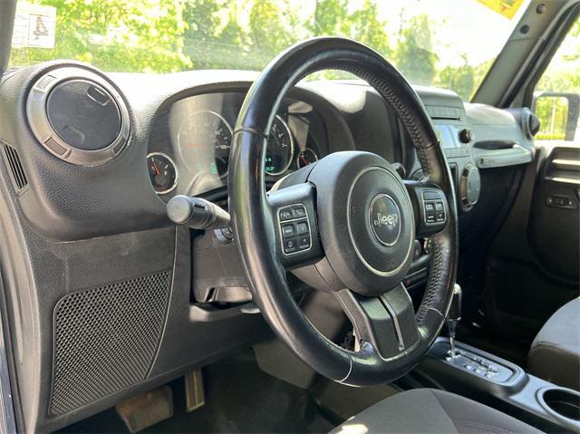 used 2018 Jeep Wrangler JK Unlimited car, priced at $21,150