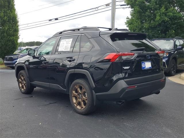 used 2023 Toyota RAV4 Hybrid car, priced at $32,000