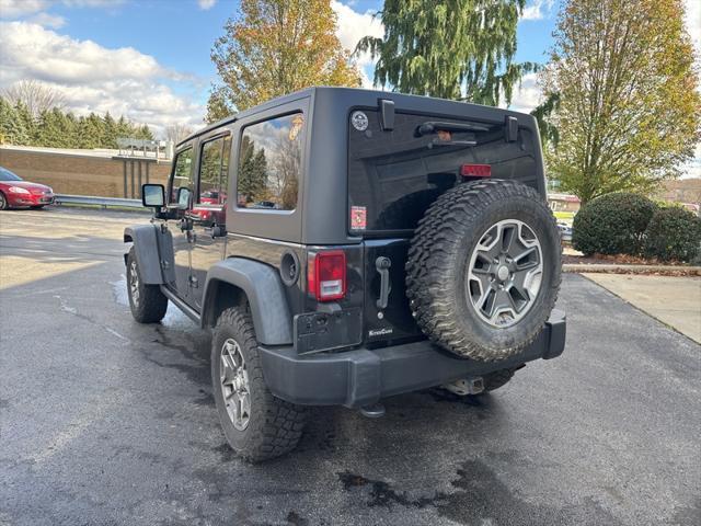 used 2014 Jeep Wrangler Unlimited car, priced at $17,190